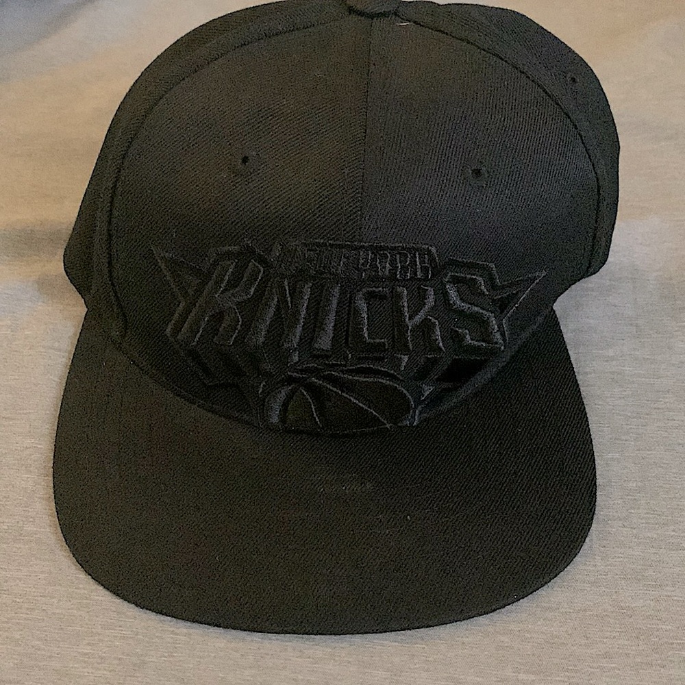 Mitchell & Ness Authentic NY Knicks Snap-back cap.